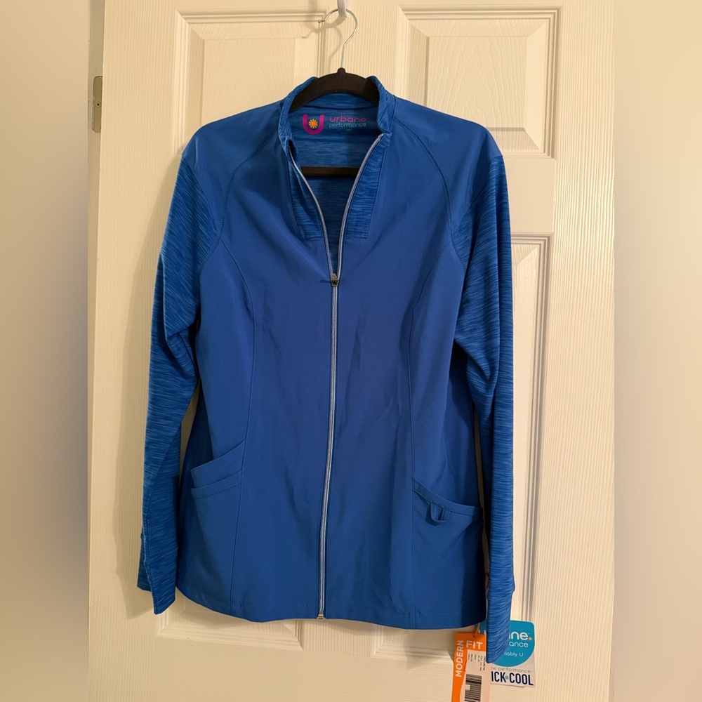 NWT Urbane Scrubs Performance royal blue scrub jacket. Size M. See measurements.